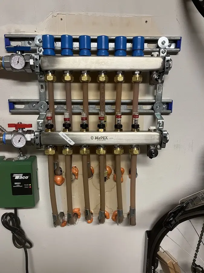 Plumber performing Gas Line Installation at a residential property in Greenwood